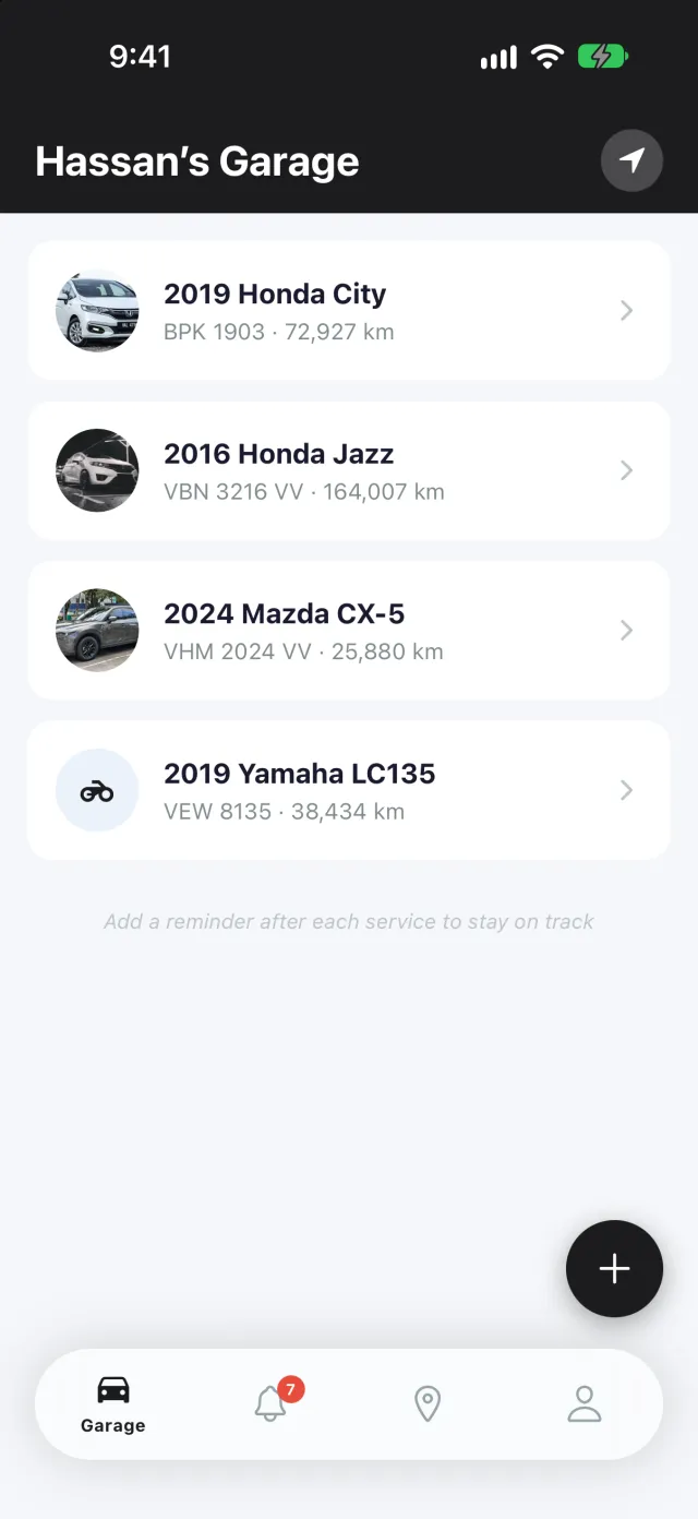 Hassan's Garage listing a 2019 Honda City, a 2016 Honda Jazz, a 2024 Mazda CX-5 and a 2019 Yamaha LC135 motorcycle, each with plate and mileage.